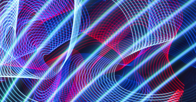 611206-abstract-picture-of-colorful-light-trails-crossing-twilight-sky-with-fast-motion-f28100aee5.jpeg